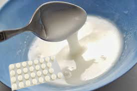  zdjęcie biała polewa zmieszana z tabletkami na libido dla kobiet 